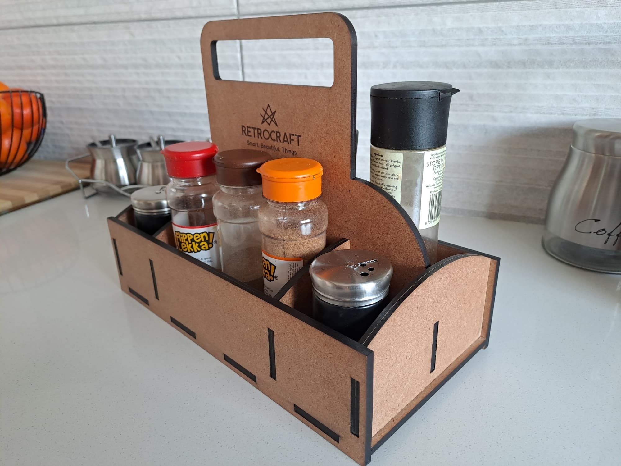 A wooden caddy laser-engraved with the RetroCraft logo