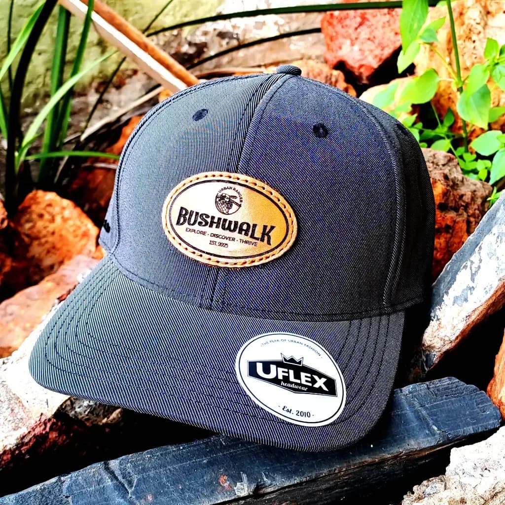 Navy cap with an oval leather patch