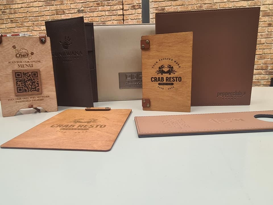 Engraved leather menu covers and holders